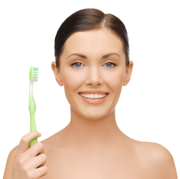 Femme avec brosse à dents
 - Photo, image