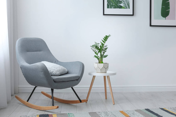 Elegant living room interior with rocking chair - Foto, Imagem
