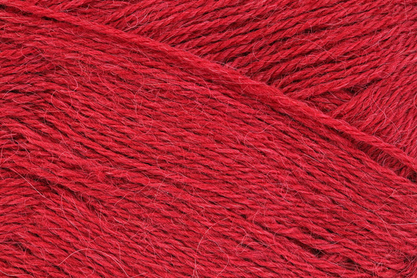 Una imagen de cerca rojo de hilo de lana para tejer. Contexto
. - Foto, Imagen