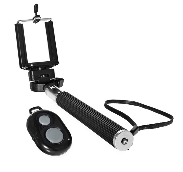 Selfie stick met afstandsbediening voor het nemen van foto's en video 's. - Foto, afbeelding