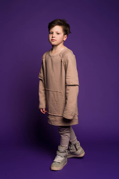 The joy of dressing is an art! Full length portrait of the handsome young boy posing at the camera and being stylish and modern dressed. - Foto, Bild