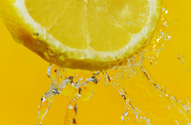 Splash and lemon. - Photo, Image