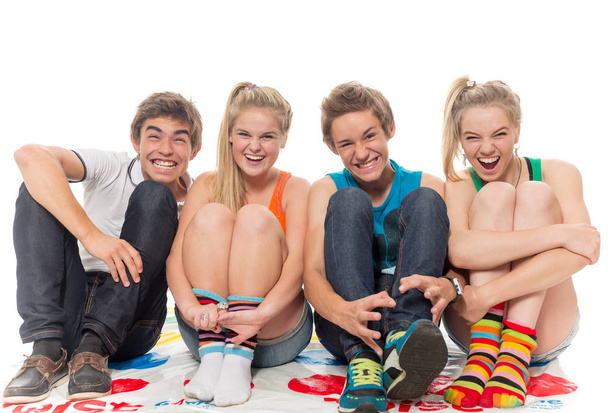 Cuatro amigos gay adolescentes en un fondo blanco
 - Foto, imagen