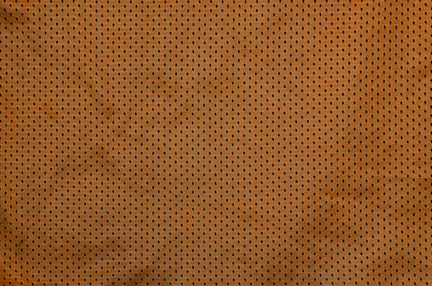 Roupa esportiva tecido textura fundo. Vista superior da superfície têxtil de pano. Camisa de basquete colorida com espaço em texto
 - Foto, Imagem