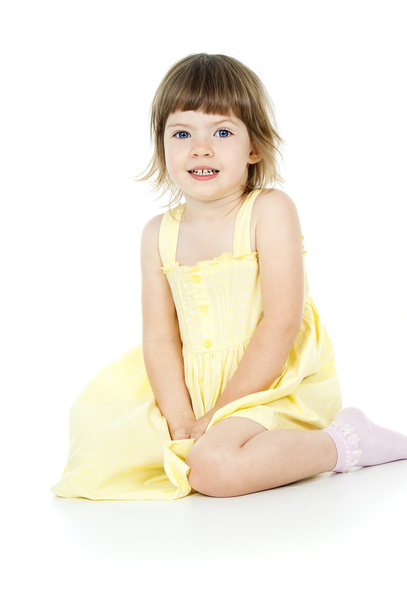 bright little girl sitting isolated - Φωτογραφία, εικόνα