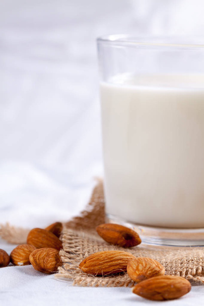 Single glass of almond milk. - Foto, imagen