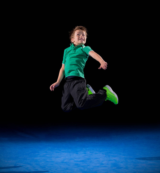 Little boy in sports hall - Фото, изображение