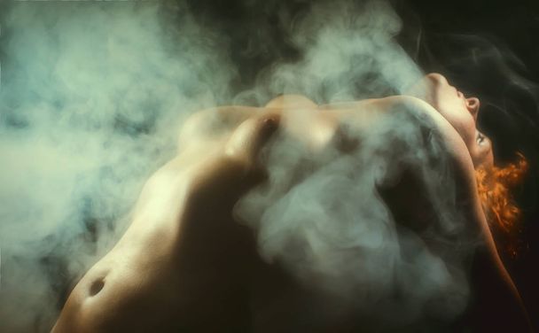 Female torso with smoke - Foto, imagen