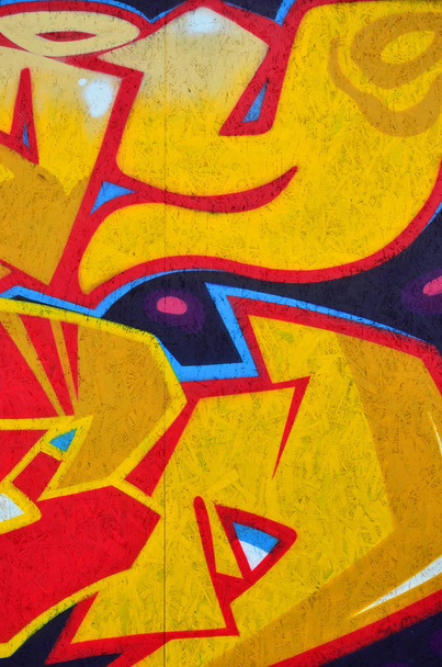 Красивые граффити уличного искусства. Абстрактный цвет творческого рисунка модных красок на стенах города. Современная городская культура. Название краски на стенах. Молодежный протест
 - Фото, изображение