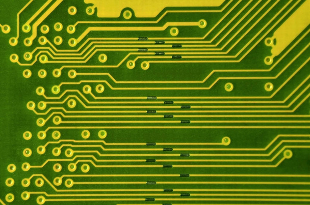 Gros plan du circuit imprimé coloré. Contexte technologique abstrait. Mécanisme informatique en détail
 - Photo, image