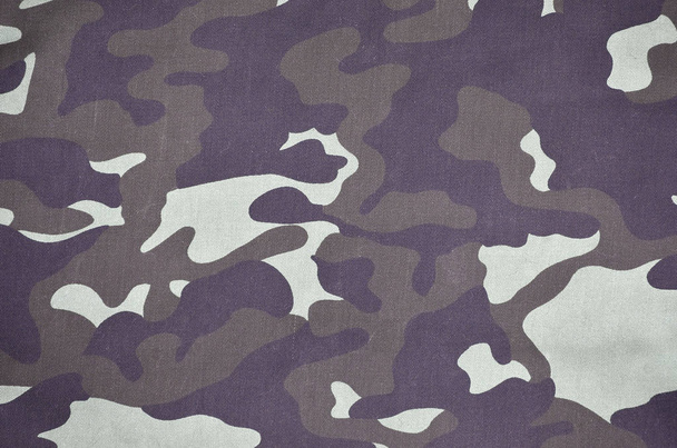 Textuur van de stof met een camouflage geschilderd in kleuren van het moeras. Leger achtergrondafbeelding. Textiel patroon van militaire camouflage stof - Foto, afbeelding