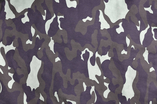 Bir kamuflaj ile kumaş dokusuna bataklık renklerde boyanmış. Ordu arka plan görüntüsü. Tekstil desen askeri kamuflaj kumaş - Fotoğraf, Görsel