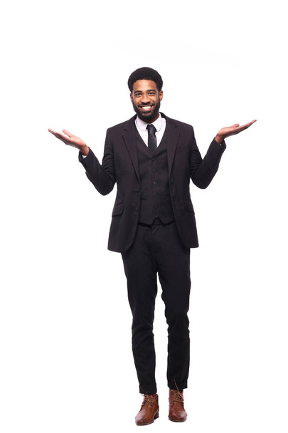 happy black man in front of a white background - 写真・画像