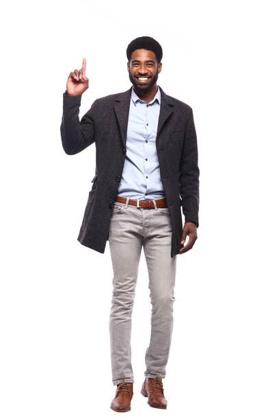 happy black man in front of a white background - Фото, изображение