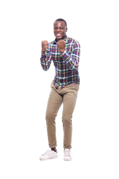 happy black man in front of a white background - Foto, afbeelding