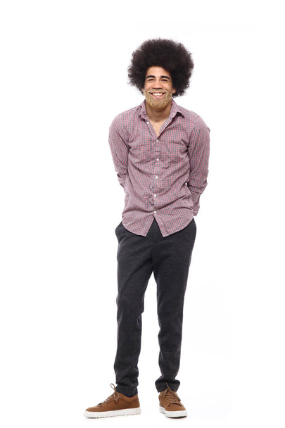 Happy afro man in front of a white background - 写真・画像