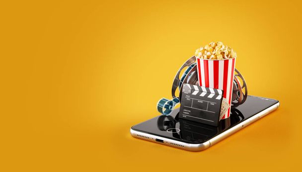 Smartphone application for online buying and booking cinema tickets. Live watching movies and video. Unusual 3D illustration of popcorn, cinema reel, disposable cup, clapper and tickets on smarthone - Fotografie, Obrázek
