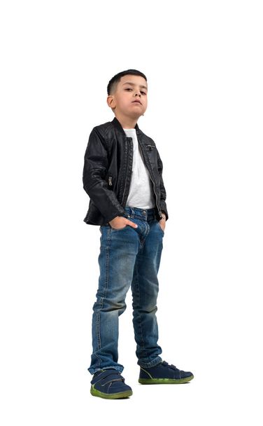 Full length portrait of the serious  little boy  of the brunette - Photo, image