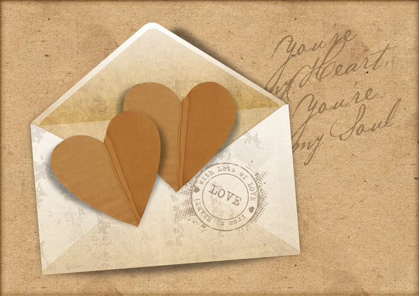 Vintage background with envelope and hearts - Foto, afbeelding