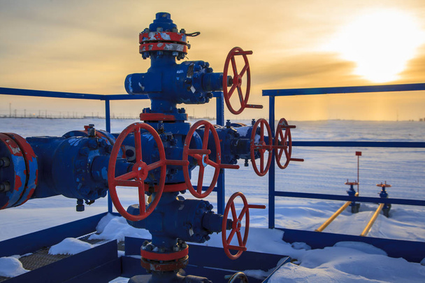 Oil, gas industry. Group wellheads and valve armature  - Фото, зображення