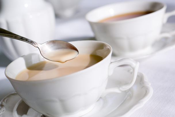 Teelöffel über Tasse Tee oder Kaffee - Foto, Bild