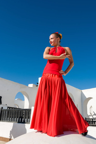 Flamenco dancer in red - Фото, изображение