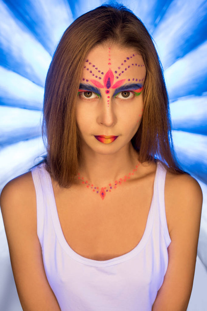 Young girl with UV make-up artistic portrait - Foto, Imagem