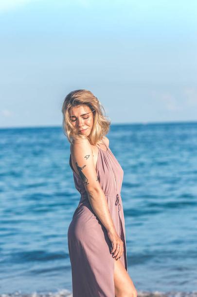 Sexy young woman posing on the tropical beach of Bali island, Indonesia. Asia. - Φωτογραφία, εικόνα