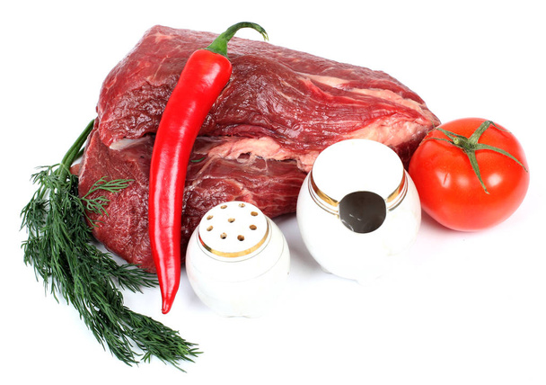 Fresh raw meat  and pepper on white background - Photo, Image