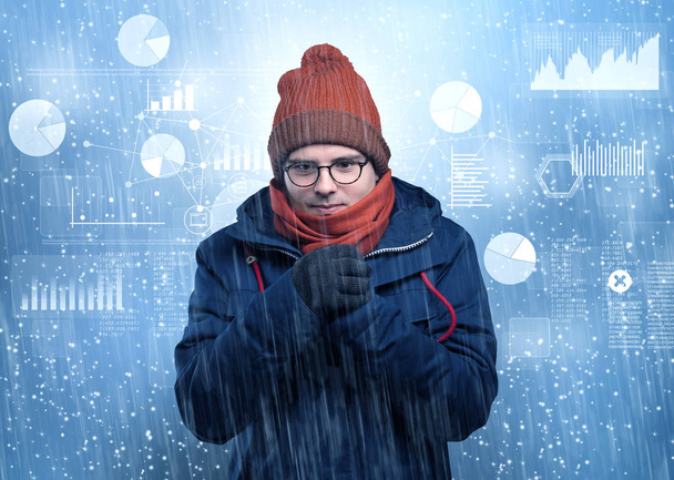 Young hipster shivering with graphs, reports and chart concept - Foto, imagen