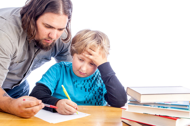 Отец и сын делают домашнее задание
 - Фото, изображение