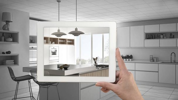 mano tablet mostrando vero rifinito cucina moderna con è
 - Foto, immagini