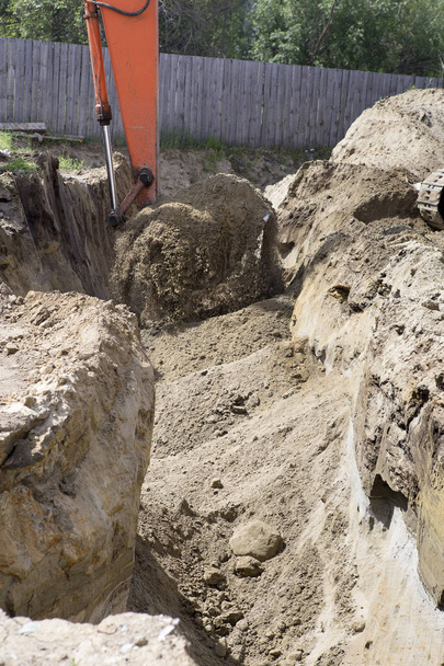 excavadora en el sitio de construcción. - Foto, imagen