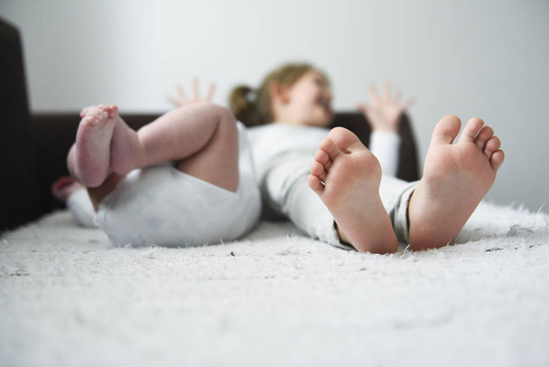 feet of young children - Foto, imagen