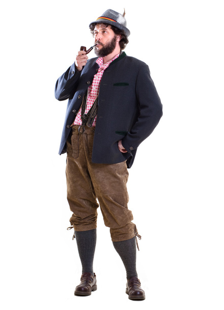 Bearded bavarian man with pipe in traditional clothing - Foto, Bild