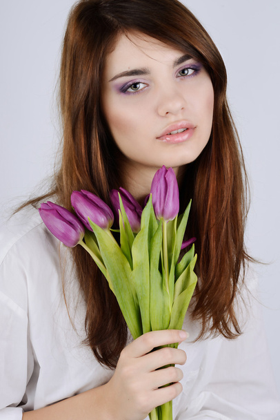 Tender girl with tulips - Foto, Bild