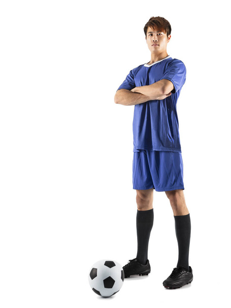 Asya Futbol futbol oyuncu genç adam ayakta - Fotoğraf, Görsel