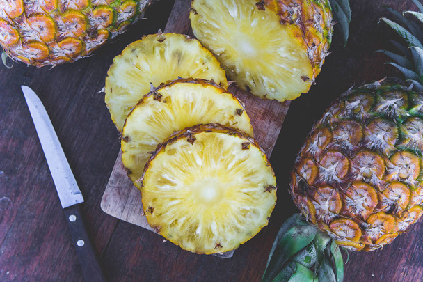 pineapple fruit on wood table - Фото, зображення