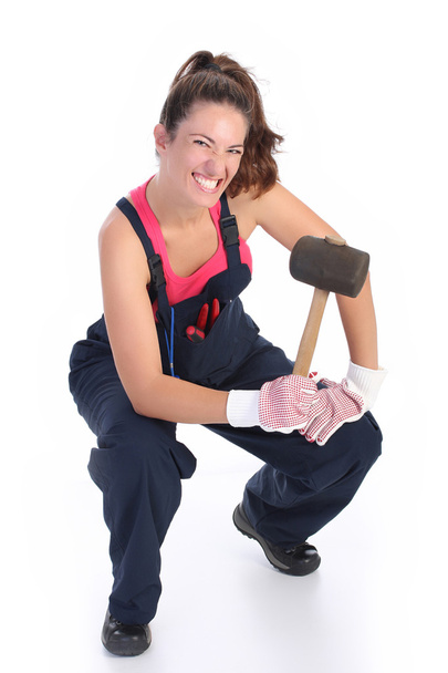 Mulher com martelo de borracha preta
 - Foto, Imagem