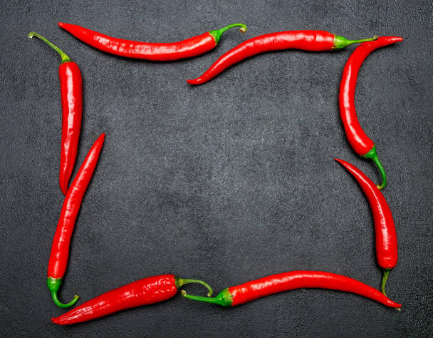 red chili pepper on dark concrete background - Valokuva, kuva