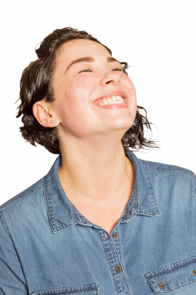 Beautiful young girl with a fashionable haircut laughing - Φωτογραφία, εικόνα