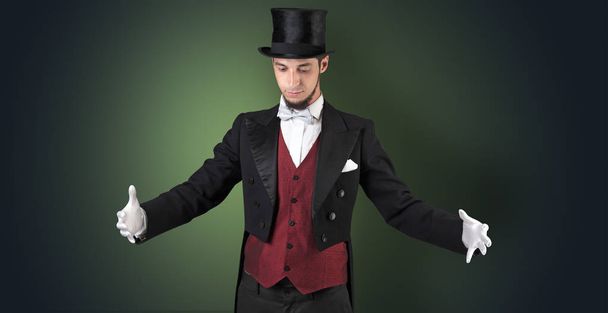 Magician holds something invisible  - Fotoğraf, Görsel