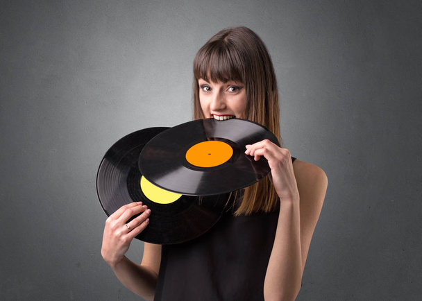 Lady holding vinyl record - Valokuva, kuva