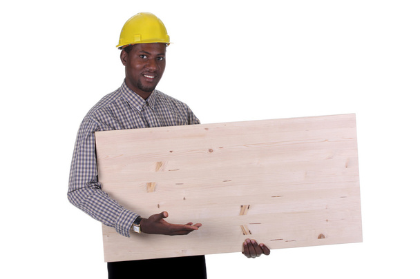 Young african american carpenter - Foto, afbeelding