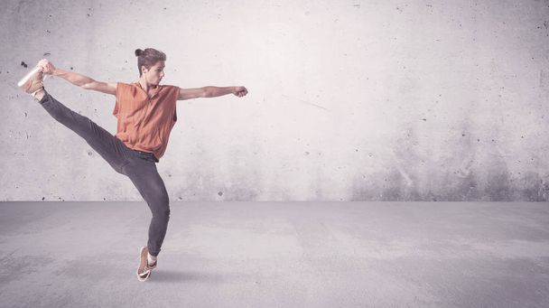Pretty urban dancer with empty background - Photo, image