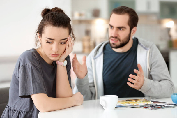 Young couple having argument at home - Photo, image