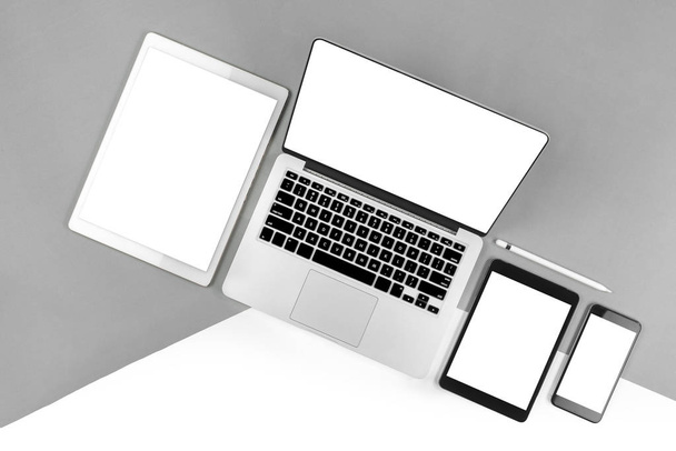 Office table with laptop computer, digital tablet, smartphone, p - Fotografie, Obrázek