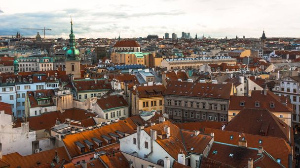 Panorama of the city of Prague. The old part of the city. Beautiful roofs of shingles. Ancient buildings and churches. - Foto, imagen