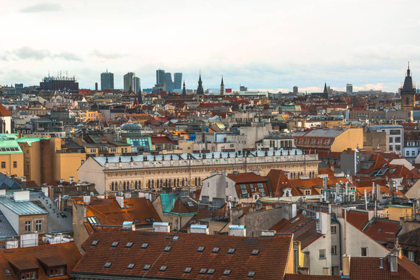 Panorama of the city of Prague. The old part of the city. Beautiful roofs of shingles. Ancient buildings and churches. - Foto, afbeelding