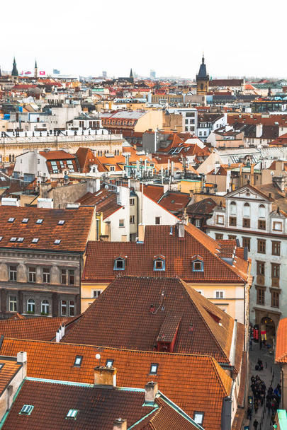 Prague / Czech - January 3 2018: Panorama of the city of Prague. The old part of the city. Beautiful roofs of shingles. Ancient buildings and churches. - Zdjęcie, obraz